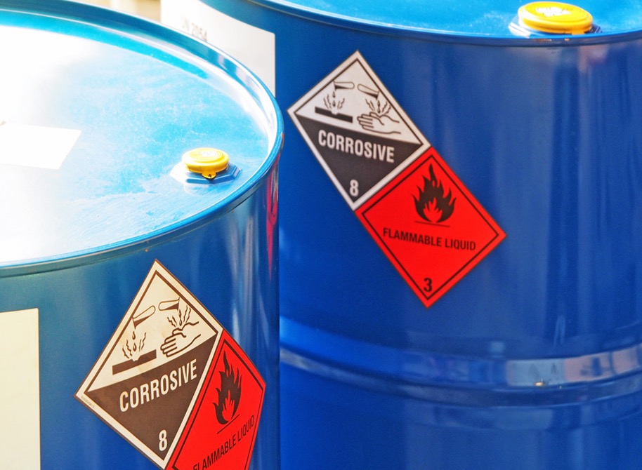 Labels like Corrosive and Flammable Liquids help make it safer to handle the materials.